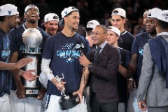 Gus Johnson with 2017 Big East Conference Tournament MVP Josh Hart and his Villanova teammates after they clinched the title at Madison Square Garden.